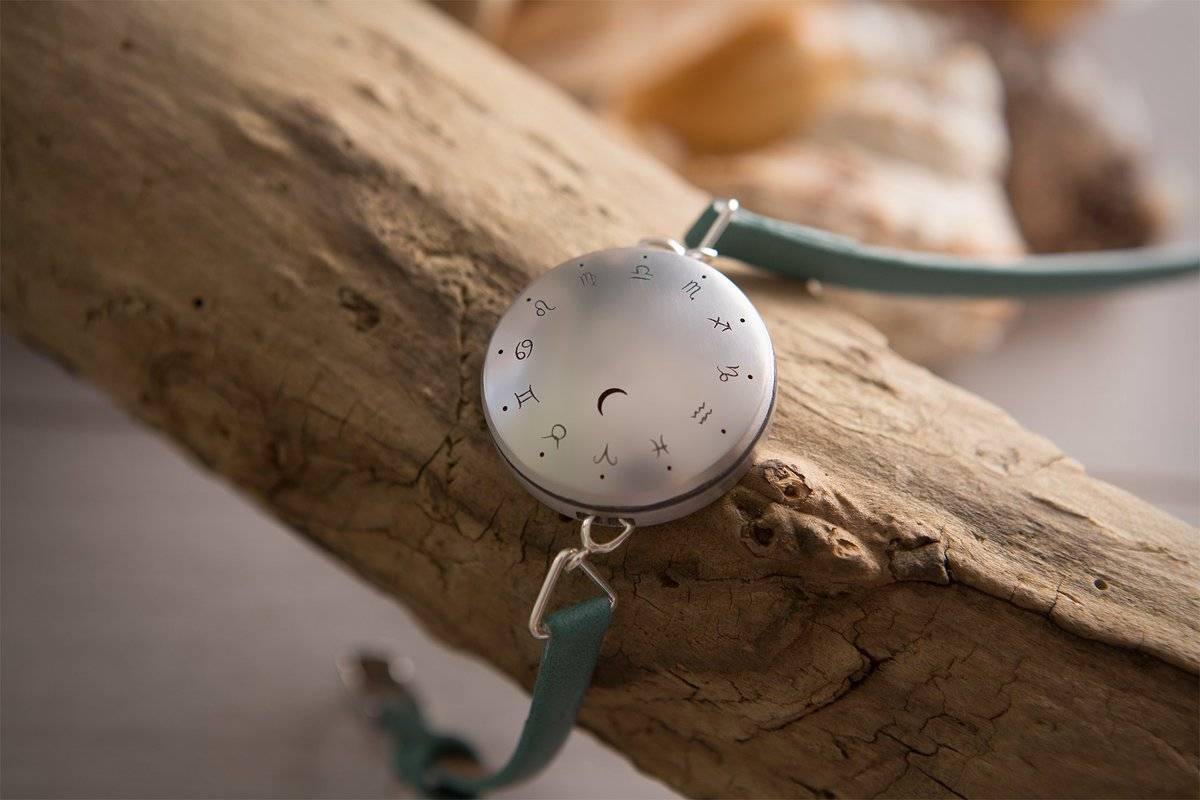 Moontrak: A fitness tracker revealing the sun and moon cycle.